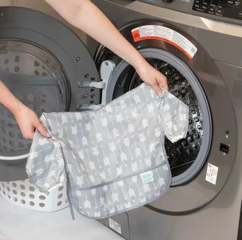 Babero BUMKINS con mangas 6-24m Flecha