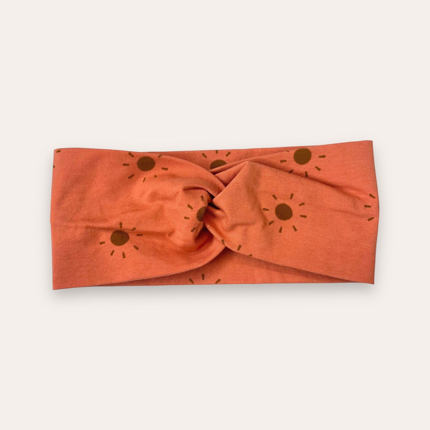 Diadema cruzada infantil Soles Salmón